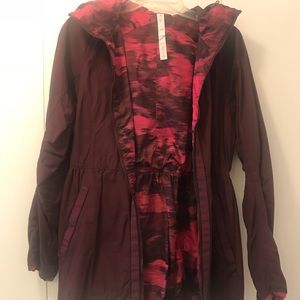 Lulu Lemon Rain Coat Dark Purple and pink Interior